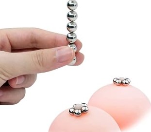 Magnetic nipple toy